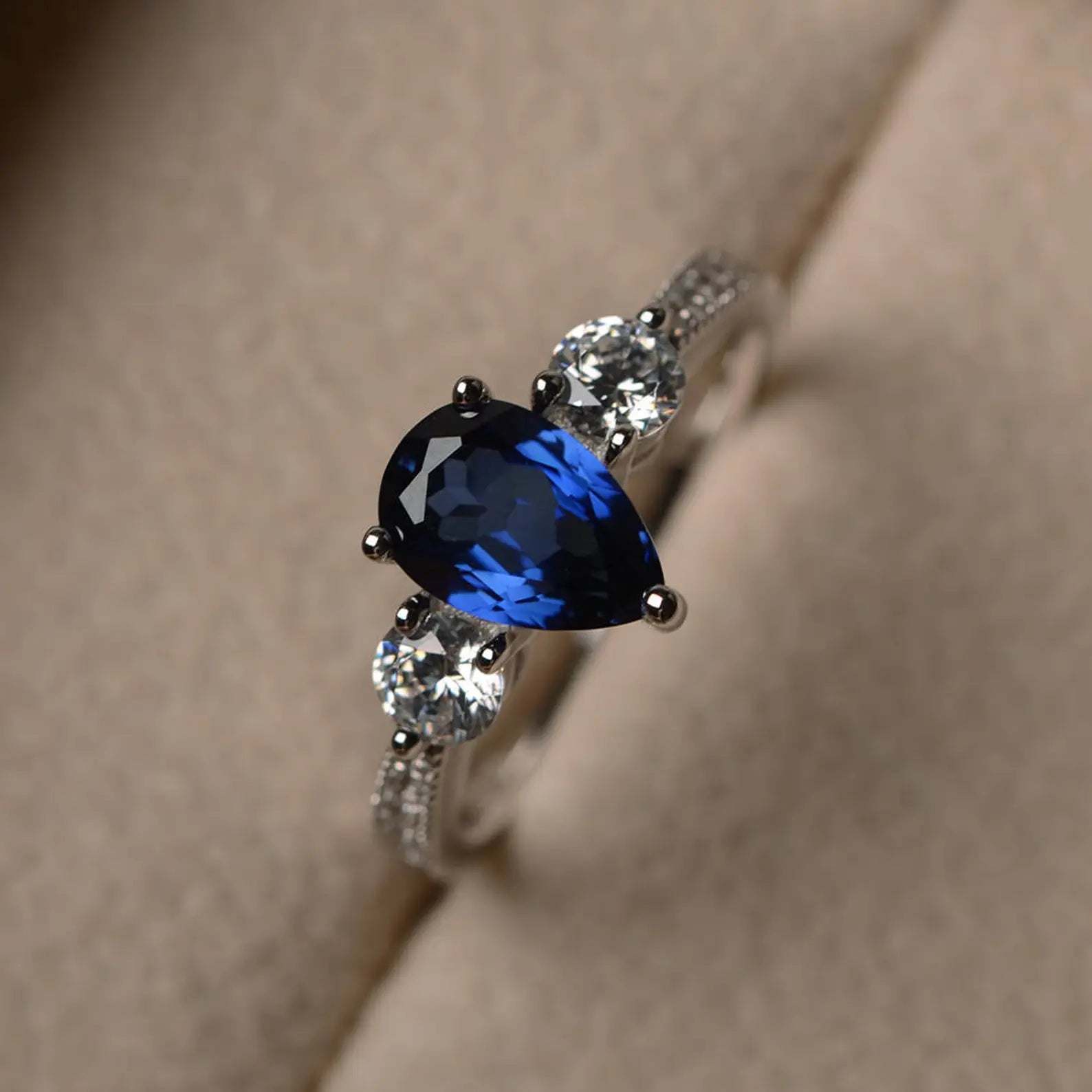 Pear cut blue sapphire ring