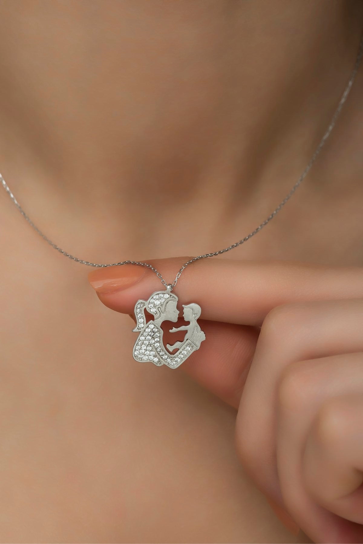 Silver zircon mother baby necklace