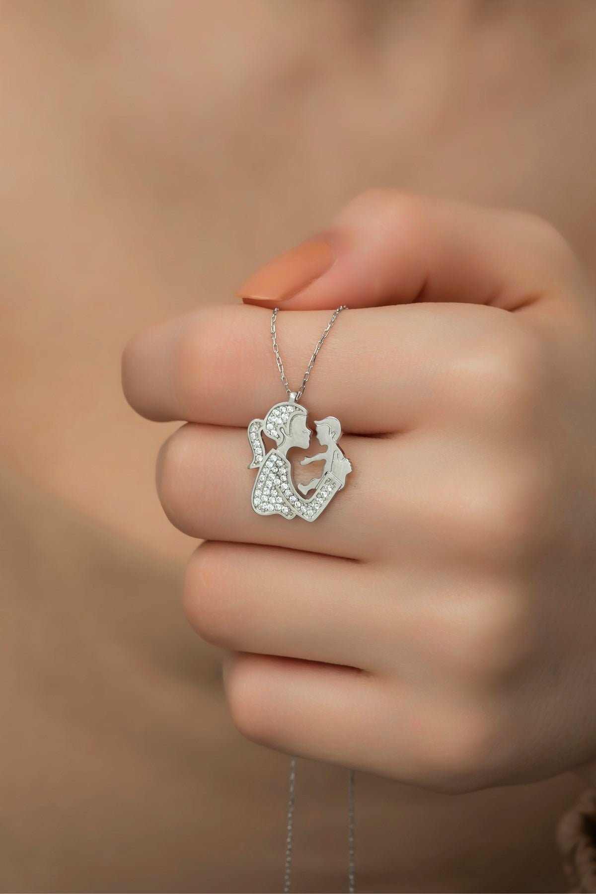 Silver zircon mother baby necklace