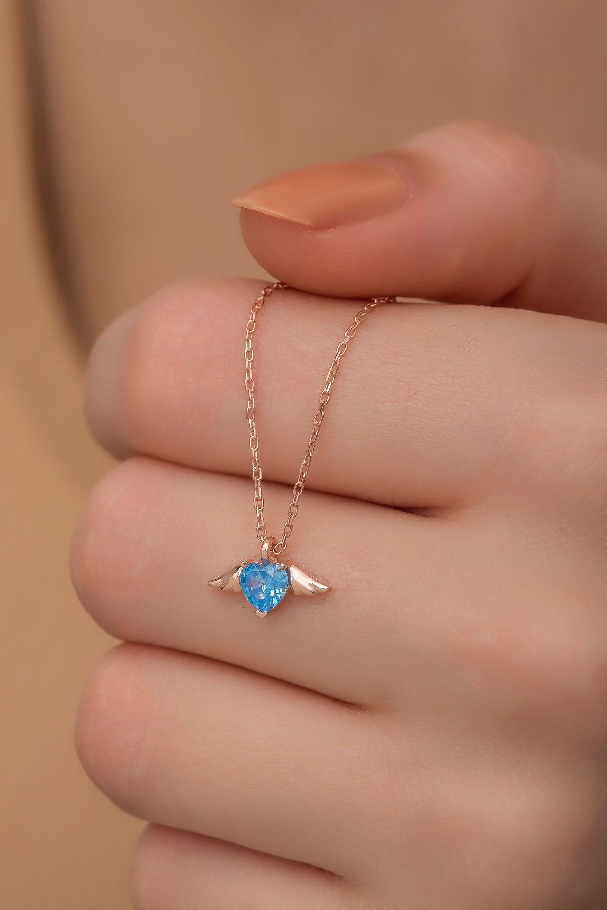 Winged flying heart necklace