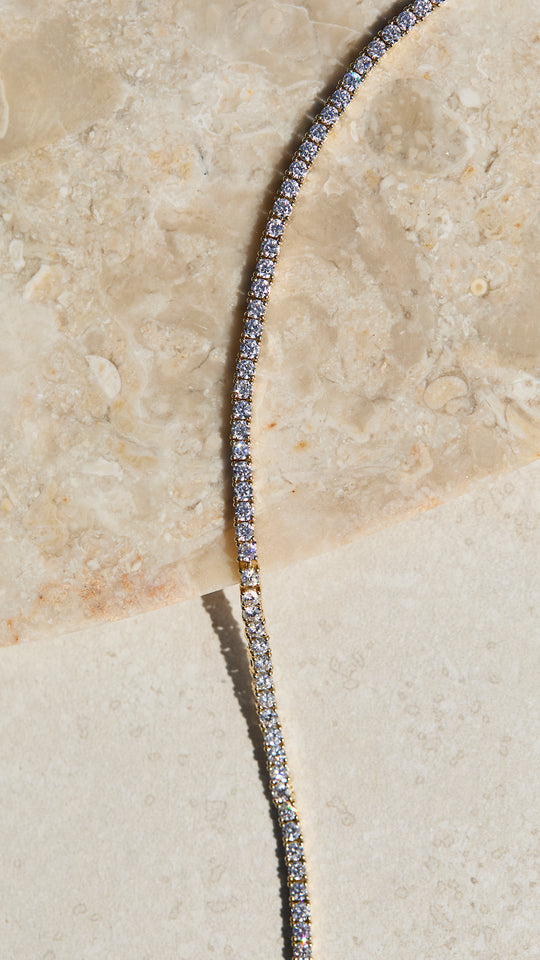 <tc>سوار التنس 3 ملم مطلي بالذهب </tc>