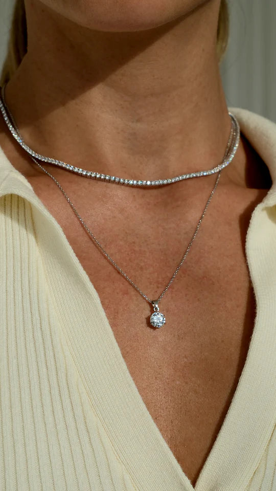 <tc> قلادة التنس الفضية </tc>