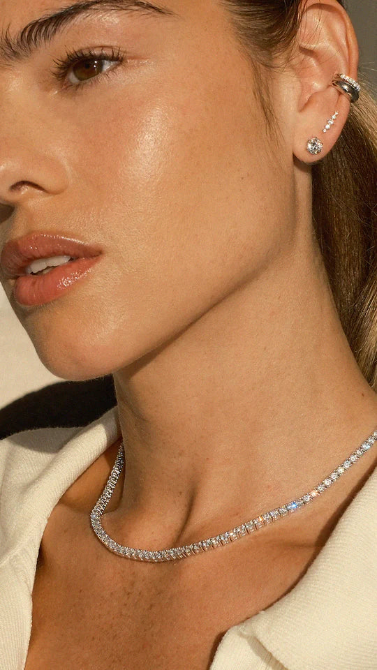 <tc> قلادة التنس الفضية </tc>