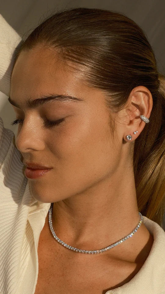 <tc> قلادة التنس الفضية </tc>