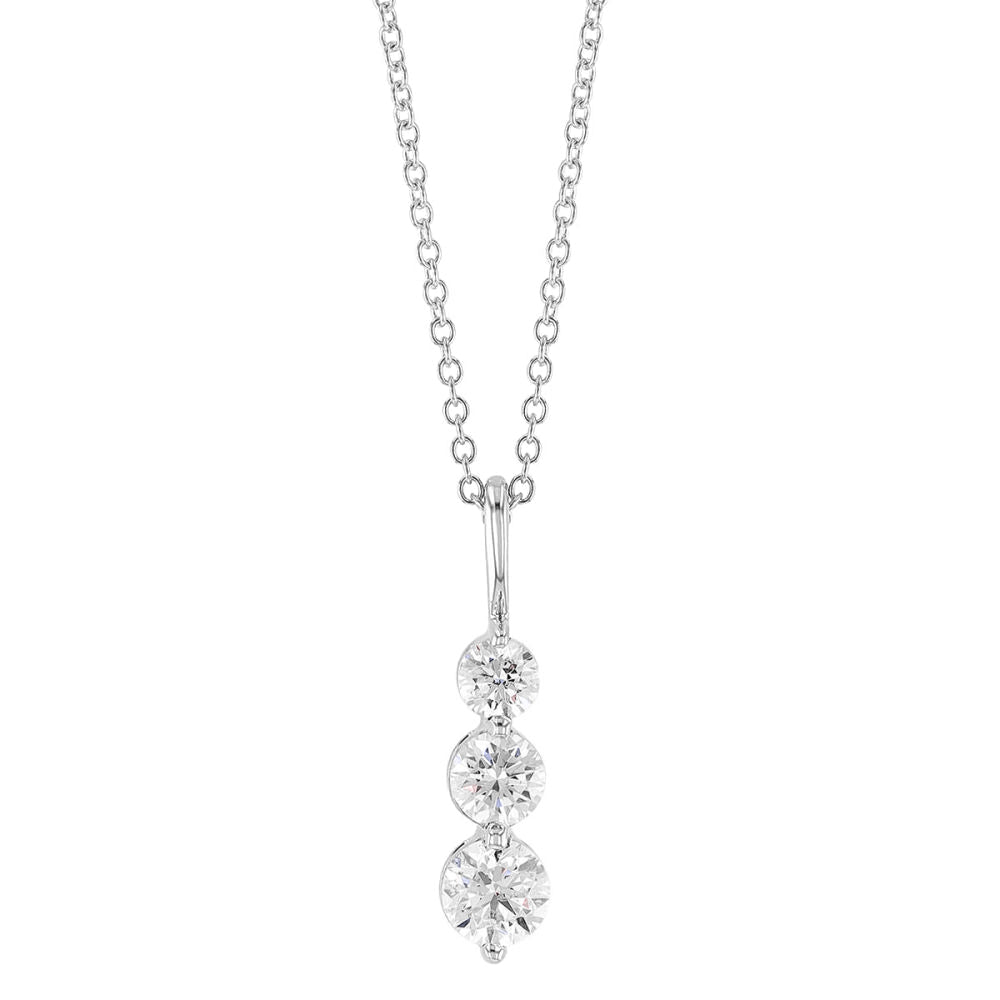 Diamond necklace with three round stones on a white background
