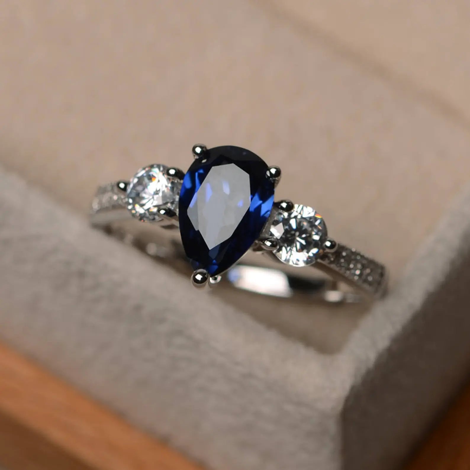 Pear cut blue sapphire ring