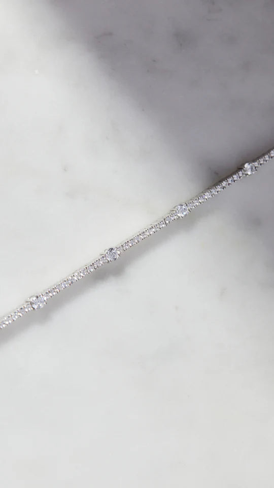 <tc>سوار التنس متعدد الأحجار </tc>