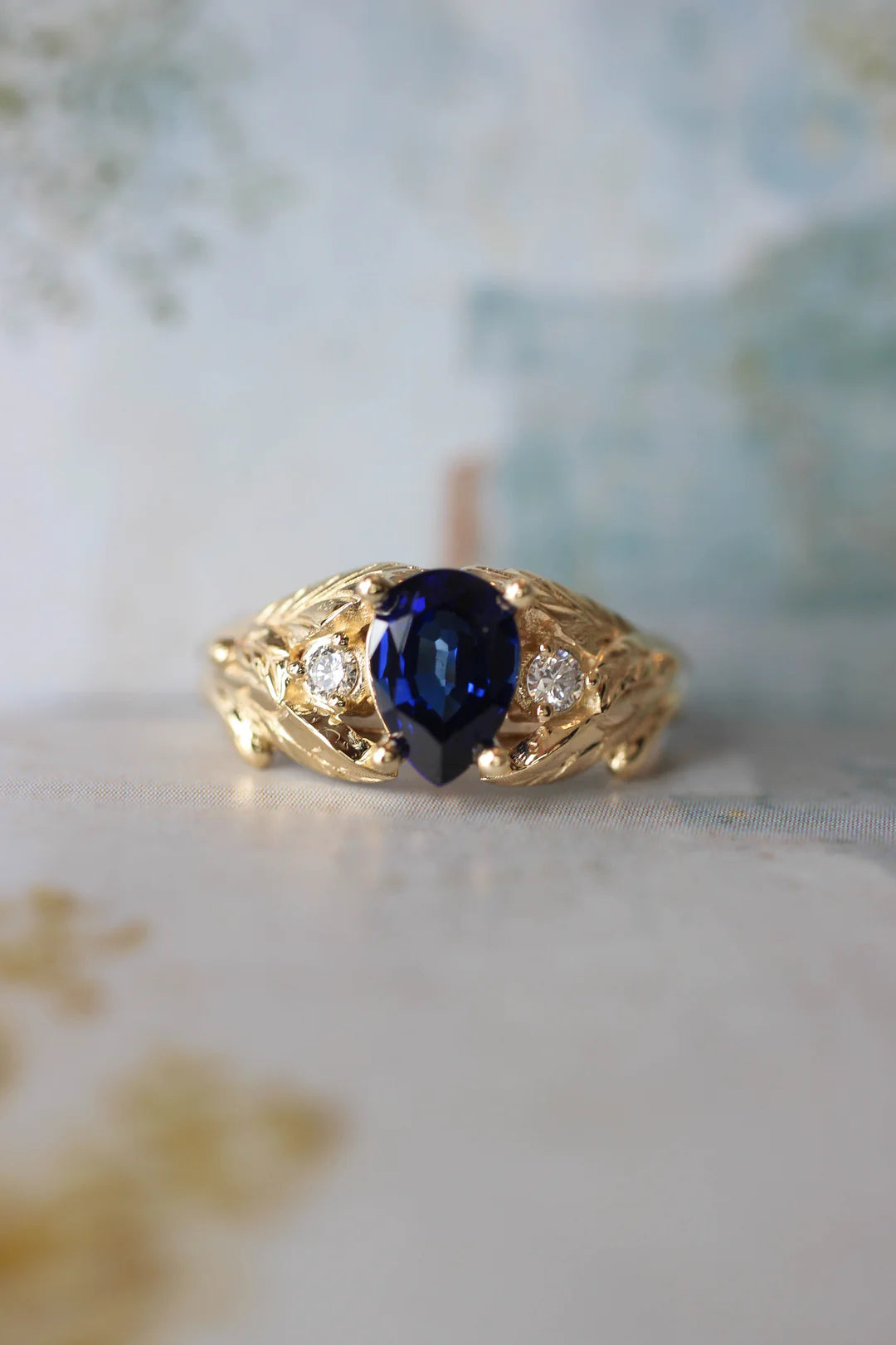 blue sapphire LEAVES ring