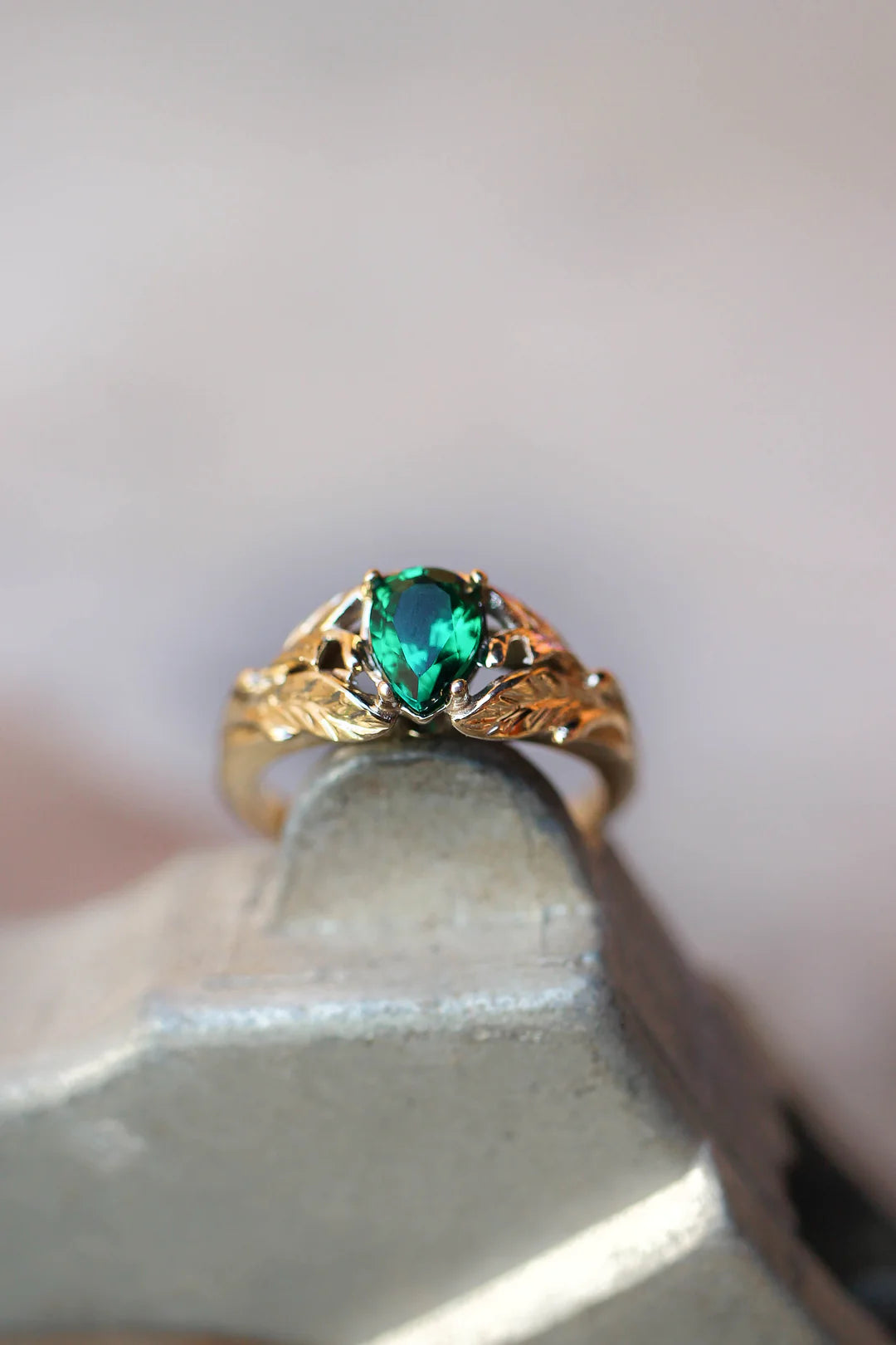 emerald stone pear cut ring