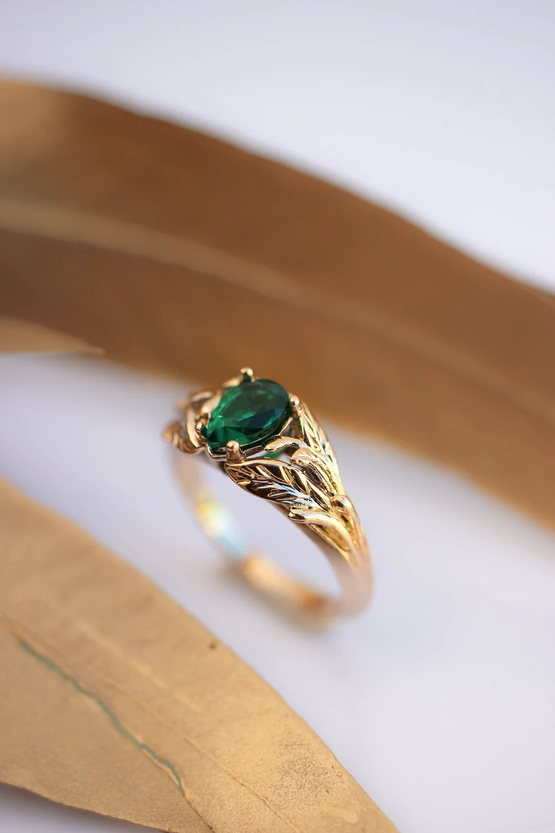 emerald stone pear cut ring