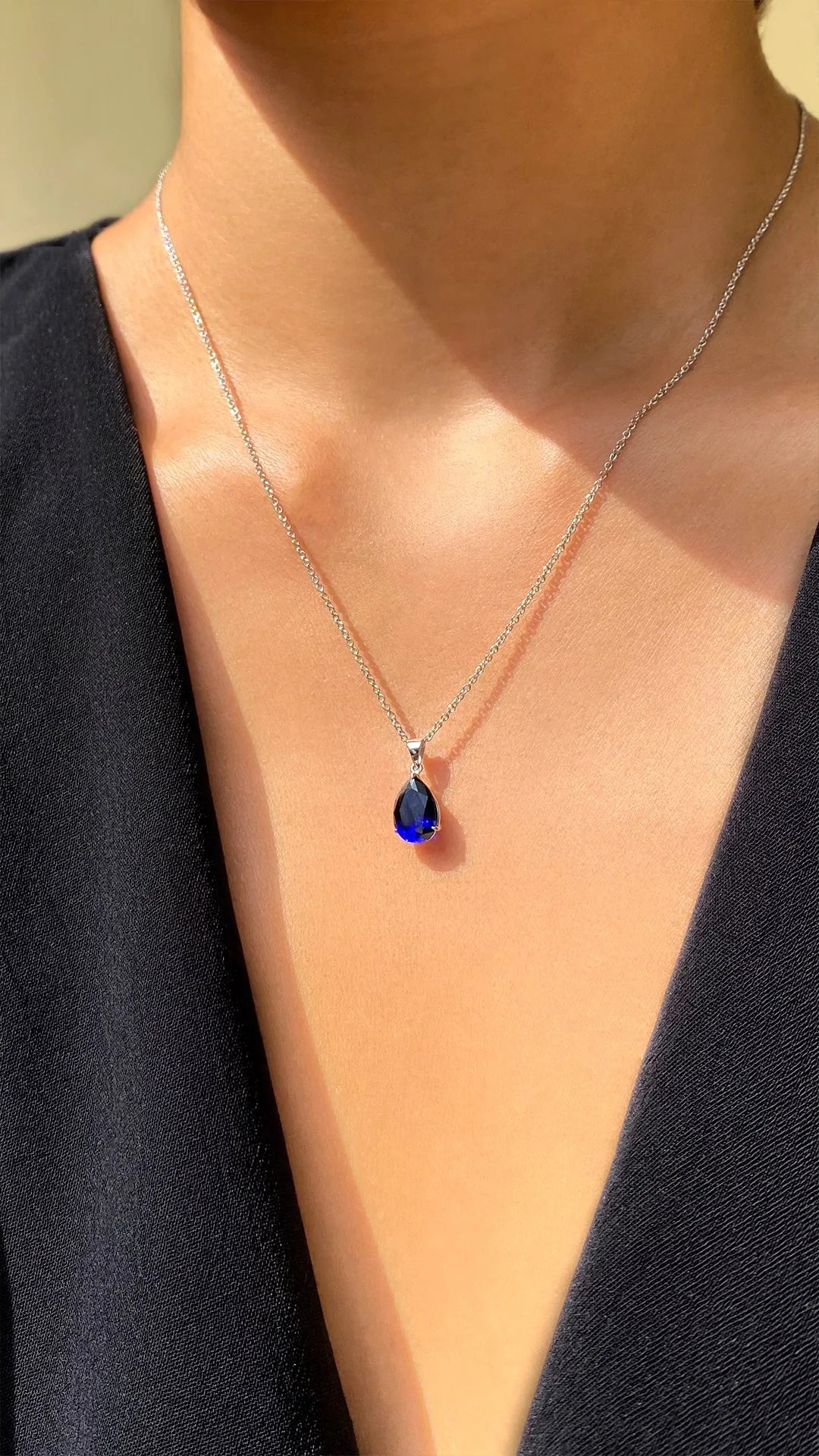 Blue sapphire charm necklace