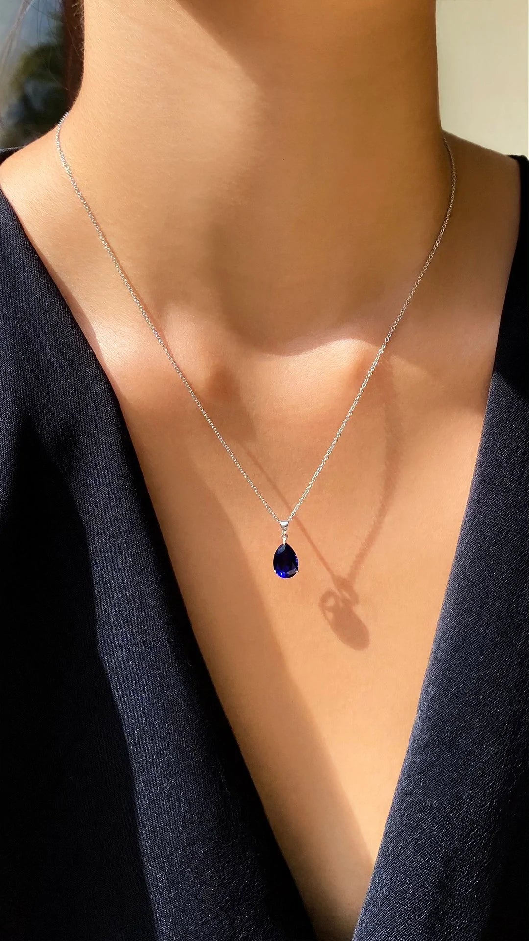 Blue sapphire charm necklace