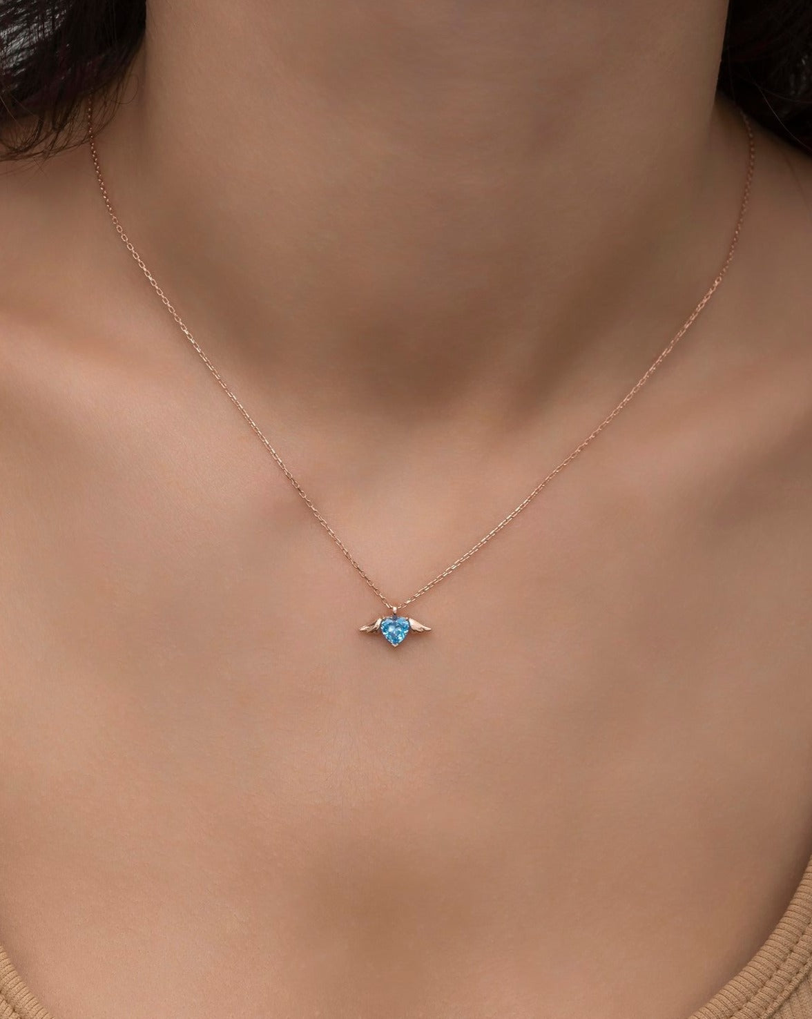 Winged flying heart necklace